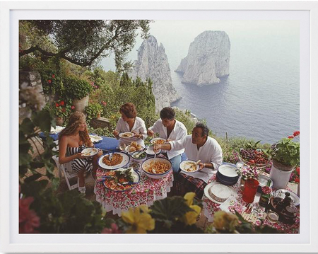 Slim Aarons - "Dining Al Fresco in Capri, Italy 1980"